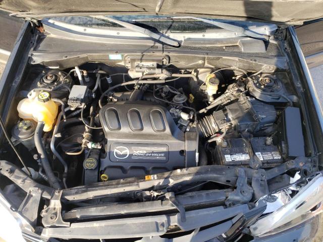 Photo 7 from auction – 2003 MAZDA TRIBUTE LX with VIN 4F2YZ94153KM29448