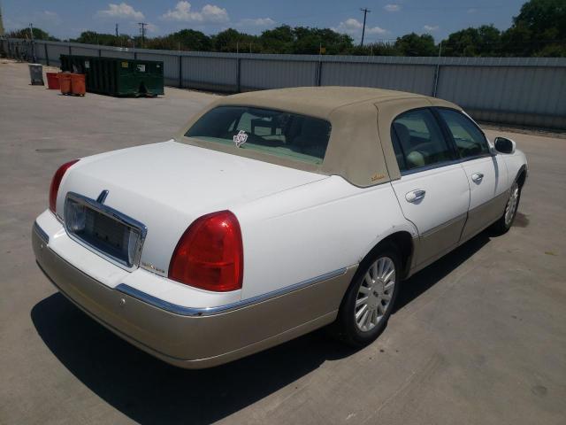 Photo 4 from auction – 2004 LINCOLN TOWN CAR E with VIN 1LNHM81WX4Y611441