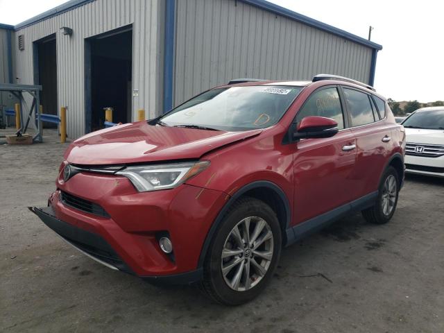 Photo 2 from auction – 2023 TOYOTA RAV4 LIMIT with VIN JTMYFREV2HJ116378