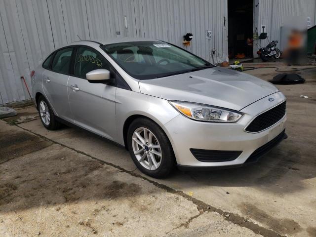 FORD FOCUS SE 2018 with VIN 1FADP3F25JL328169 - Photo from auction