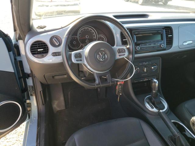Photo 9 from auction – 2014 VOLKSWAGEN BEETLE with VIN 3VW517AT1EM813787