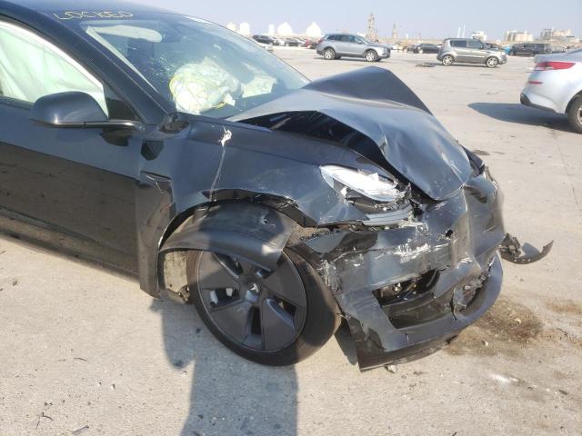 Photo 9 from auction – 2022 TESLA MODEL 3 with VIN 5YJ3E1EB4NF190375