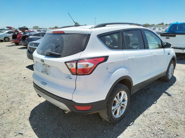 Photo 4 from auction – 2018 FORD ESCAPE SE with VIN 1FMCU9GD8JUA57213