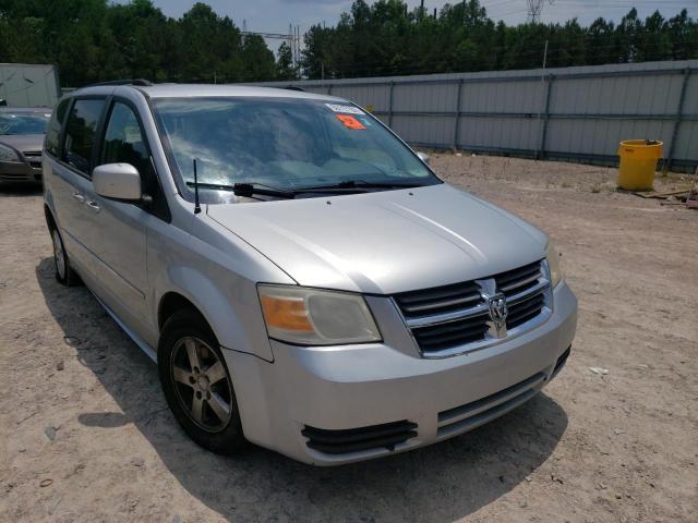 DODGE GRAND CARA 2010 with VIN 2D4RN5D18AR233286 - Photo from auction