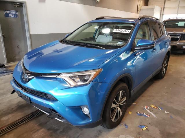 Photo 2 from auction – 2018 TOYOTA RAV4 ADVEN with VIN JTMRFREV1JD223155