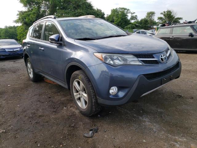 TOYOTA RAV4 XLE 2014 with VIN JTMWFREV8ED033300 - Photo from auction