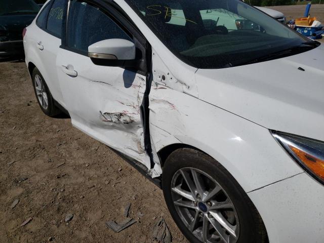 Photo 9 from auction – 2017 FORD FOCUS SE with VIN 1FADP3F29HL217943
