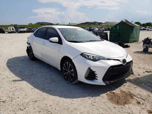 TOYOTA COROLLA L/ 2018 with VIN 5YFBURHE3JP825099 - Photo from auction