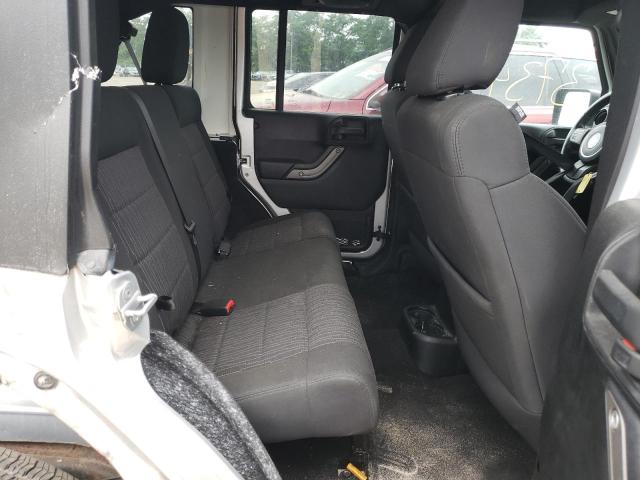Photo 6 from auction – 2011 JEEP WRANGLER U with VIN 1J4HA3H1XBL577564