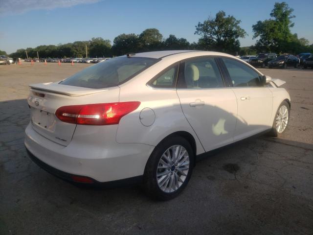 Photo 4 from auction – 2017 FORD FOCUS TITA with VIN 1FADP3J29HL288132
