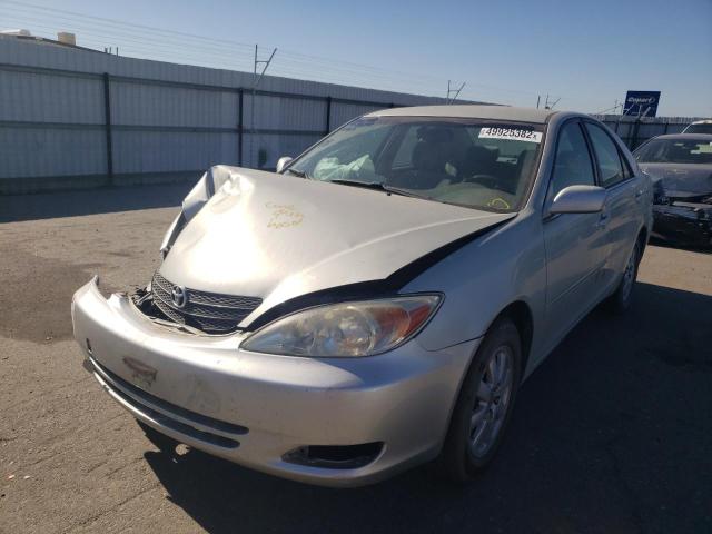 Photo 2 from auction – 2002 TOYOTA CAMRY LE with VIN JTDBE30K420051341