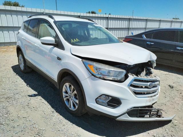 Photo 1 from auction – 2018 FORD ESCAPE SE with VIN 1FMCU9GD8JUA57213
