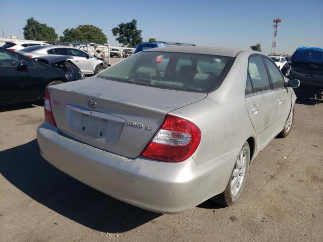 Photo 4 from auction – 2002 TOYOTA CAMRY LE with VIN JTDBE30K420051341