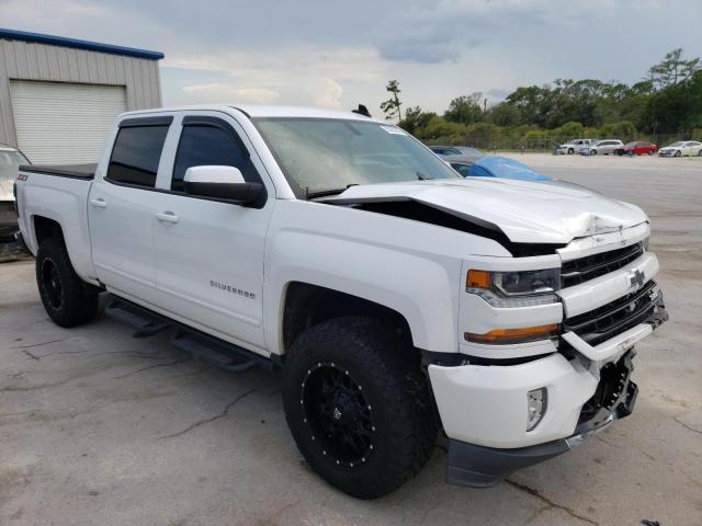 CHEVROLET SILVERADO 2018 with VIN 3GCUKREC0JG608763 - Photo from auction