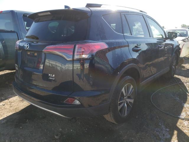 Photo 4 from auction – 2017 TOYOTA RAV4 XLE with VIN JTMRFREV9HJ158230