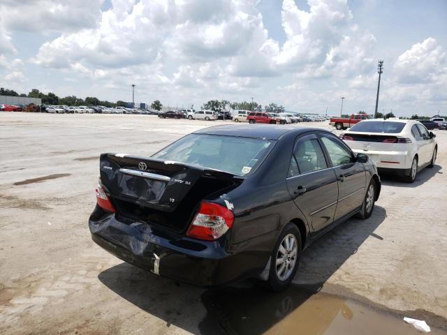 Photo 4 from auction – 2002 TOYOTA CAMRY LE with VIN JTDBF30K720022560