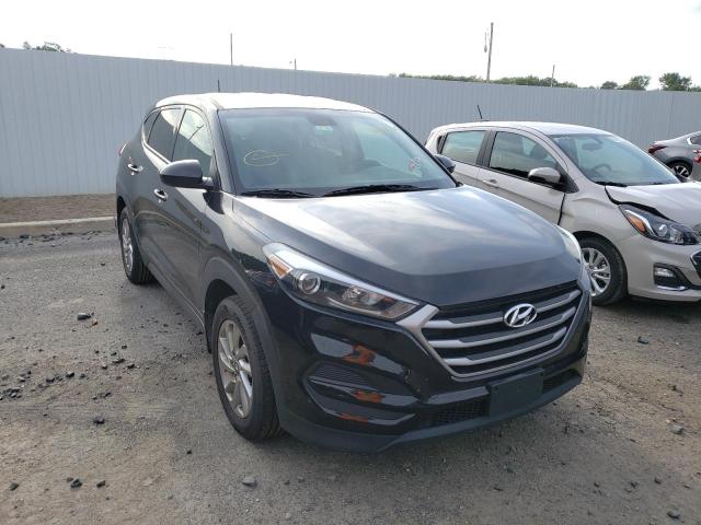 HYUNDAI TUCSON SE 2018 with VIN KM8J2CA43JU766098 - Photo from auction