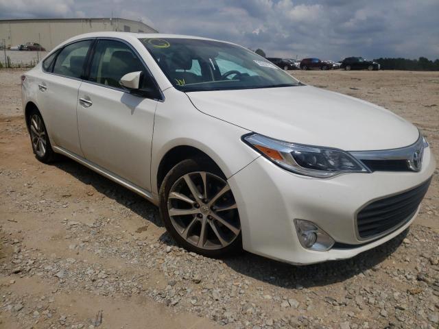 TOYOTA AVALON 2014 with VIN 4T1BK1EB3EU109695 - Photo from auction
