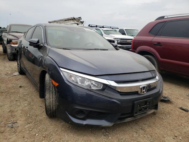 HONDA CIVIC EX 2018 with VIN 19XFC2F8XJE044171 - Photo from auction