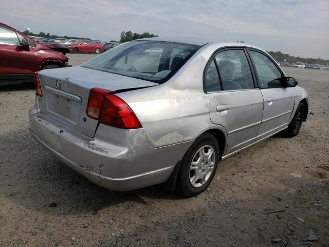 Photo 4 from auction – 2002 HONDA CIVIC LX with VIN 1HGES16532L023669