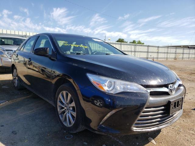 TOYOTA CAMRY LE 2017 with VIN 4T1BF1FK7HU749075 - Photo from auction