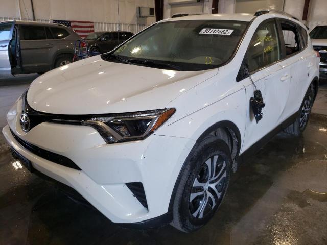 Photo 2 from auction – 2016 TOYOTA RAV4 LE with VIN JTMBFREV0GJ094191