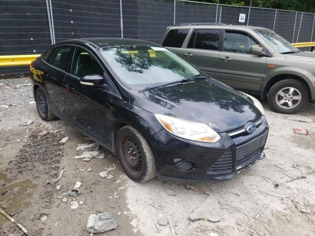FORD FOCUS SE 2014 with VIN 1FADP3F24EL379054 - Photo from auction