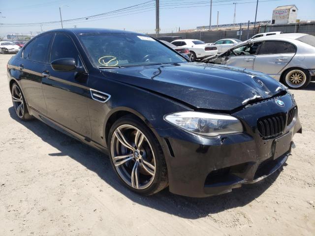 BMW M5 2013 with VIN WBSFV9C51DD096932 - Photo from auction