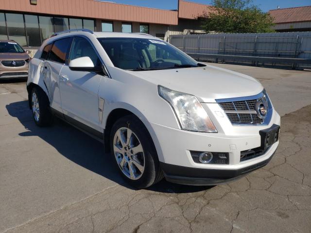 CADILLAC SRX PERFOR 2012 with VIN 3GYFNBE35CS631277 - Photo from auction