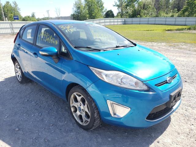 FORD FIESTA SES 2012 with VIN 3FADP4FJ6CM102172 - Photo from auction