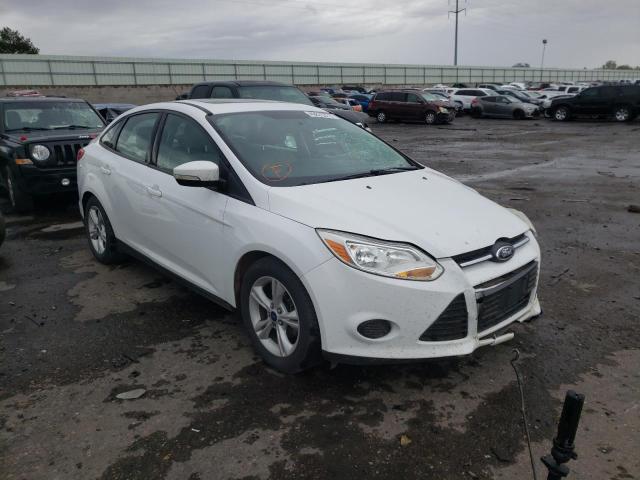 FORD FOCUS SE 2014 with VIN 1FADP3F21EL409868 - Photo from auction