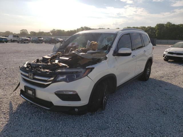 Photo 2 from auction – 2018 HONDA PILOT TOUR with VIN 5FNYF5H96JB024033