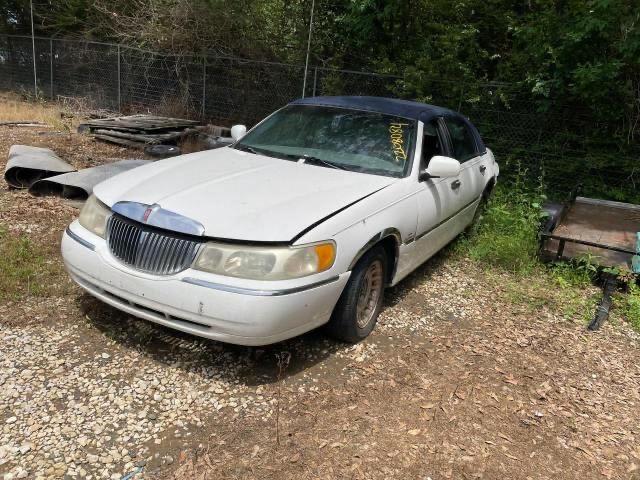 Photo 2 from auction – 1998 LINCOLN TOWN CAR E with VIN 1LNFM81W4WY675470