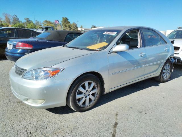 Photo 2 from auction – 2004 TOYOTA CAMRY LE with VIN 4T1BF32KX4U068971