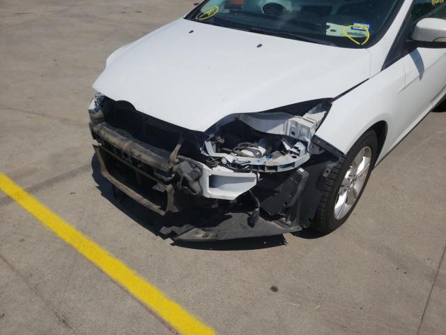 Photo 9 from auction – 2013 FORD FOCUS SE with VIN 1FADP3F28DL234744