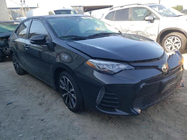 TOYOTA COROLLA L 2017 with VIN 5YFBURHE0HP653981 - Photo from auction