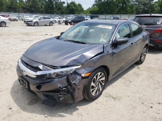 Photo 2 from auction – 2017 HONDA CIVIC EX with VIN 2HGFC2F86HH556672
