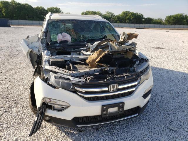 Photo 9 from auction – 2018 HONDA PILOT TOUR with VIN 5FNYF5H96JB024033