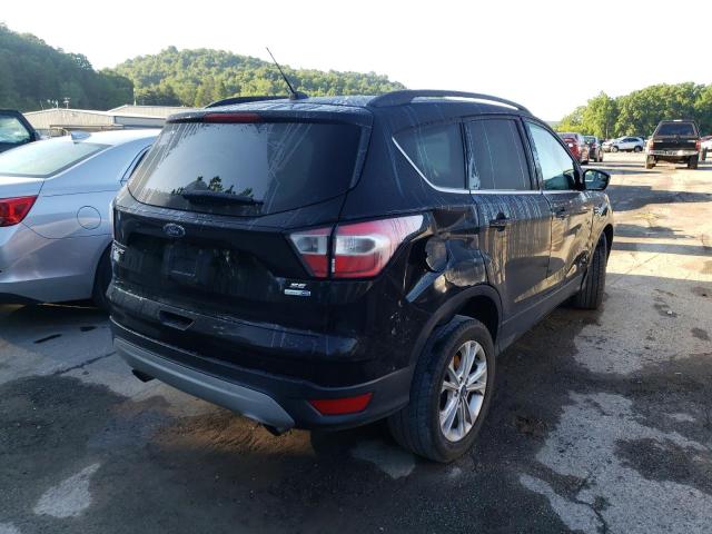 Photo 4 from auction – 2018 FORD ESCAPE SE with VIN 1FMCU9GD1JUA10895