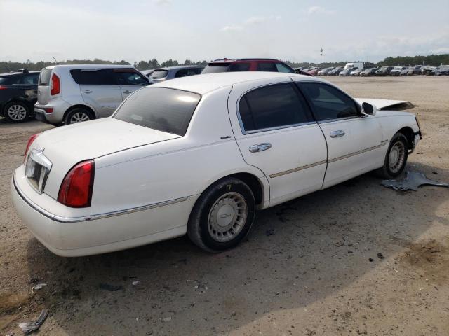 Photo 4 from auction – 2002 LINCOLN TOWN CAR E with VIN 1LNHM81W22Y626500
