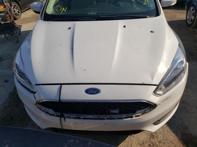Photo 9 from auction – 2017 FORD FOCUS SE with VIN 1FADP3K25HL327653