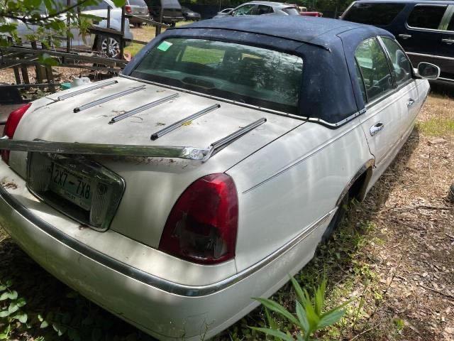 Photo 4 from auction – 1998 LINCOLN TOWN CAR E with VIN 1LNFM81W4WY675470