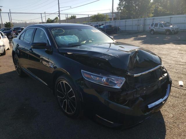 FORD TAURUS SEL 2018 with VIN 1FAHP2H8XJG136526 - Photo from auction