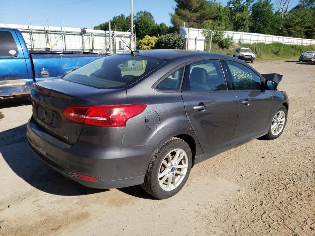 Photo 4 from auction – 2018 FORD FOCUS SE with VIN 1FADP3F29JL203756