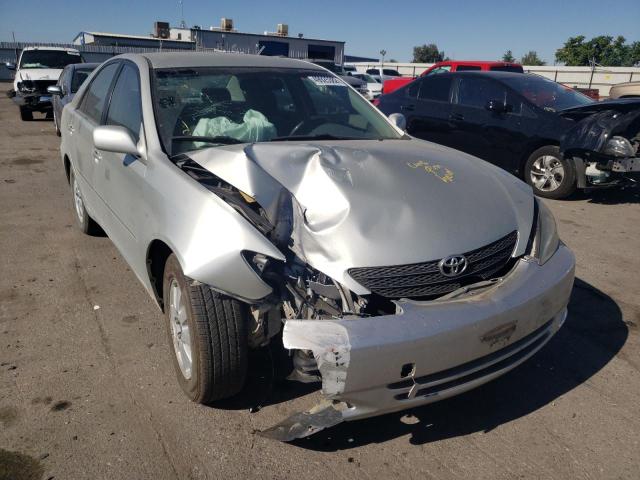 Photo 9 from auction – 2002 TOYOTA CAMRY LE with VIN JTDBE30K420051341