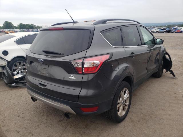Photo 4 from auction – 2018 FORD ESCAPE SE with VIN 1FMCU9GD5JUC40455