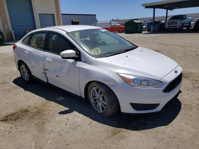 FORD FOCUS SE 2016 with VIN 1FADP3F26GL284675 - Photo from auction