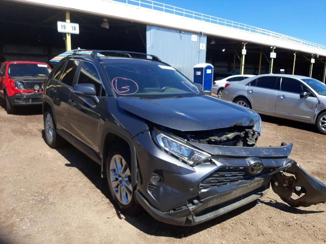 TOYOTA RAV4 XLE P 2019 with VIN JTMC1RFVXKD028336 - Photo from auction