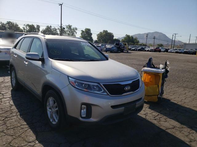KIA SORENTO LX 2014 with VIN 5XYKT3A69EG438070 - Photo from auction
