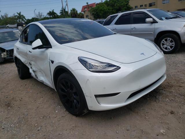TESLA MODEL Y 2021 with VIN 5YJYGDEEXMF081039 - Photo from auction